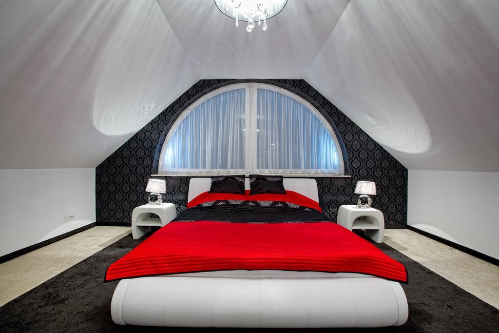 Hotel Millenium Góra Motyczna Szoba fotó